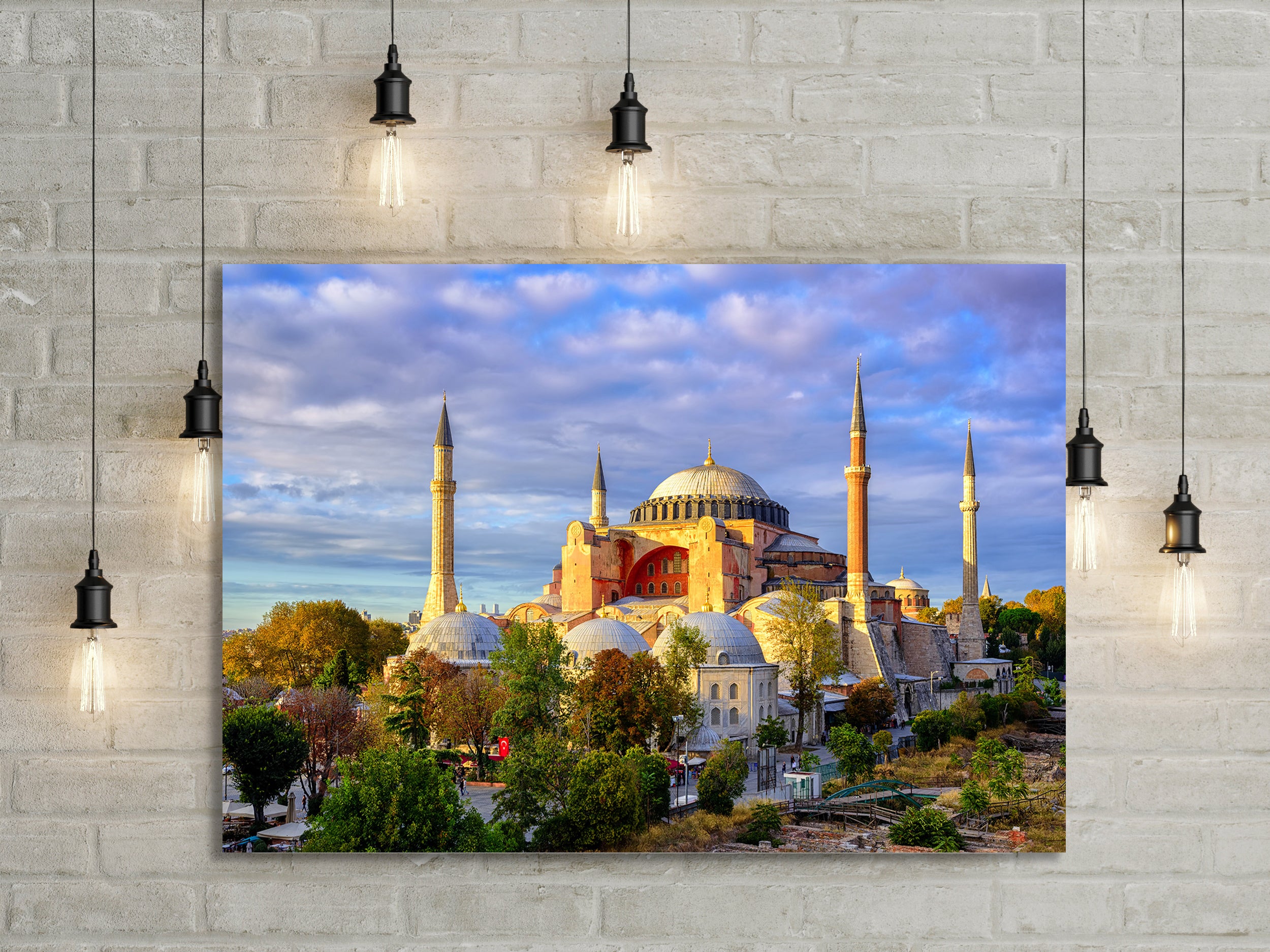Hagia Sophia domes and minarets in the old town of Istanbul, Turkey, on sunset
