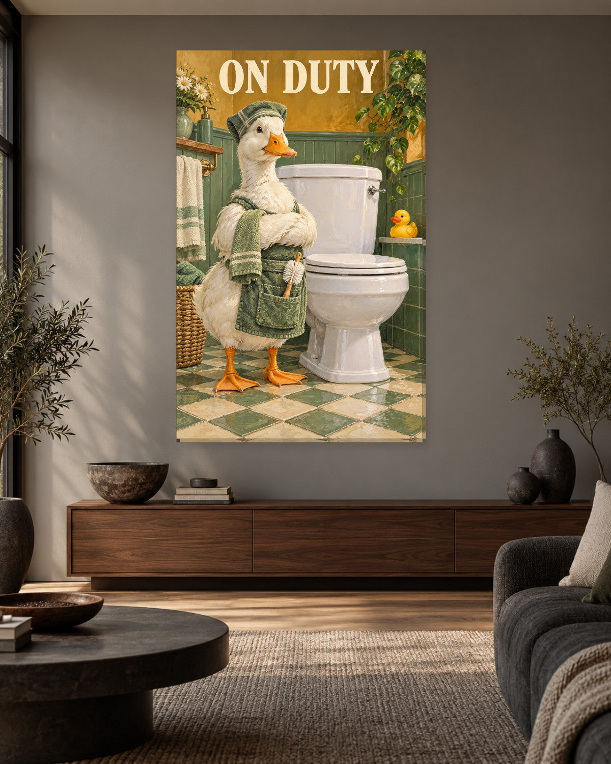 White duck in a green cap and apron with a toilet brush under On Duty lettering – funny toilet sign canvas