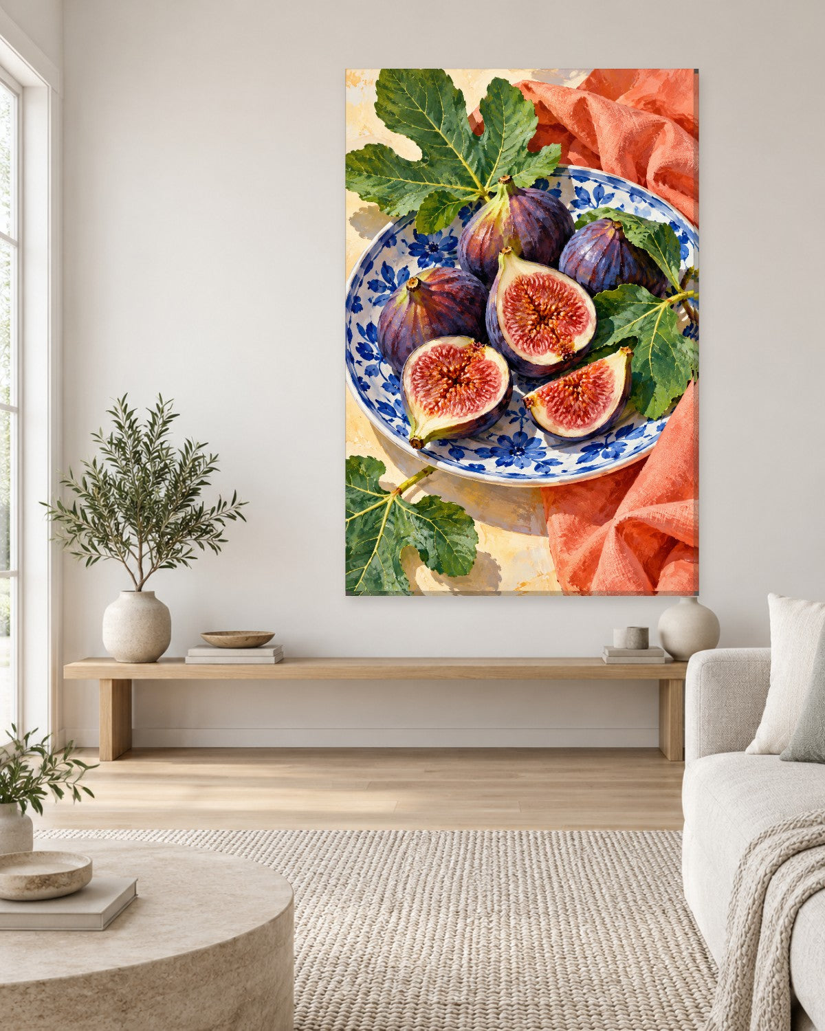 Whole and halved purple figs on a blue and white floral plate with fig leaves, seen from above – tall kitchen canvas