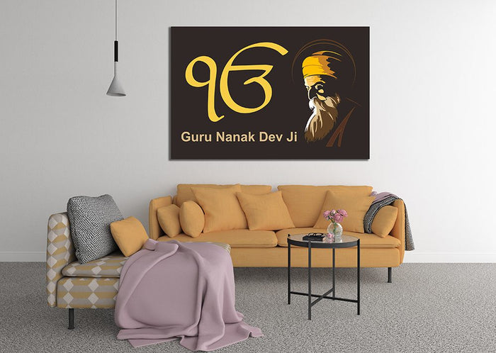 Guru Nanak Dev Ji and Ek Onkar black and gold Sikh canvas displayed above a sofa